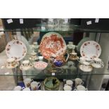 A collection of modern Crown Derby porcelain to include a partridge teapot, plates, cups and saucers
