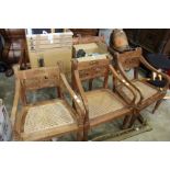 An eastern carved hardwood settee and three armchairs.