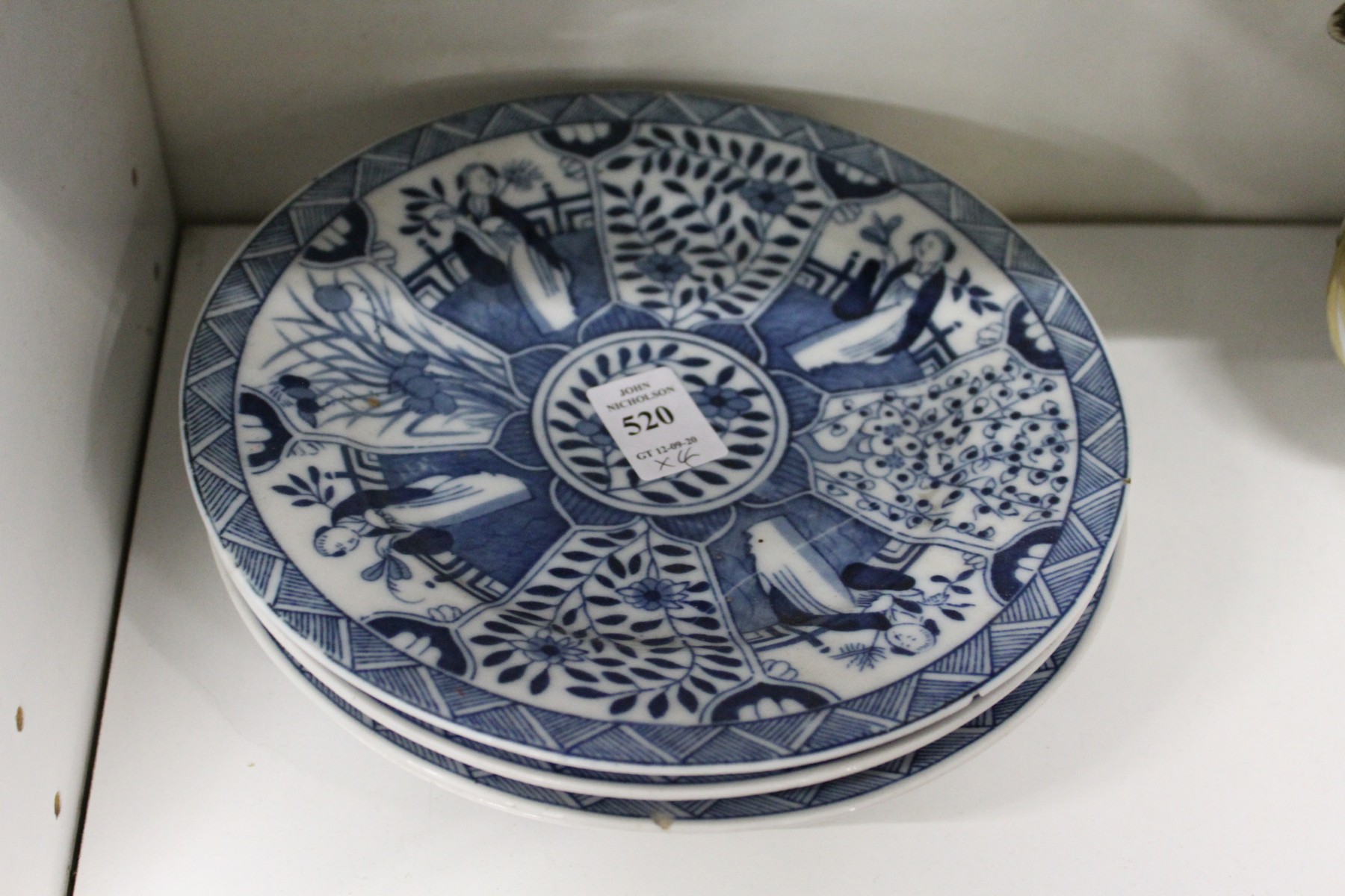 Four blue and white Chinese plates.