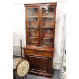 A Victorian mahogany secretaire cupboard bookcase.