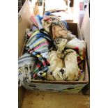 A box of various textiles.