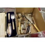 A cased fish serving set and other cutlery.