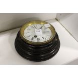 A small Victorian wall clock.