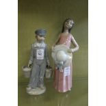 Two Lladro figures of a young Dutch boy holding milk pails together with a young woman holding a