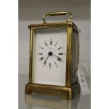 An Asprey's brass carriage clock.