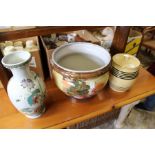 An oriental vase, a jardiniere and biscuit barrel and cover.