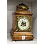 An oak cased mantle clock.