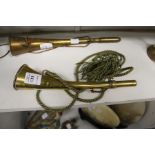 A brass hunting horn.