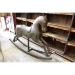 A large eastern style rocking horse.