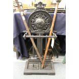 A Victorian stle cast iron stick stand.