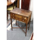 A 19th century mahogany two drawer work table.