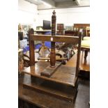 A 19th century oak table top clothes press.