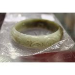 A Chinese jade bangle.