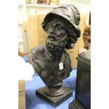 A cast spelter bust of a classical male figure.
