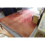 A good large red ground Bokhara style carpet.