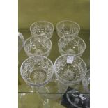 A set of six cut glass bowls.