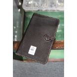 A leather wallet / case.