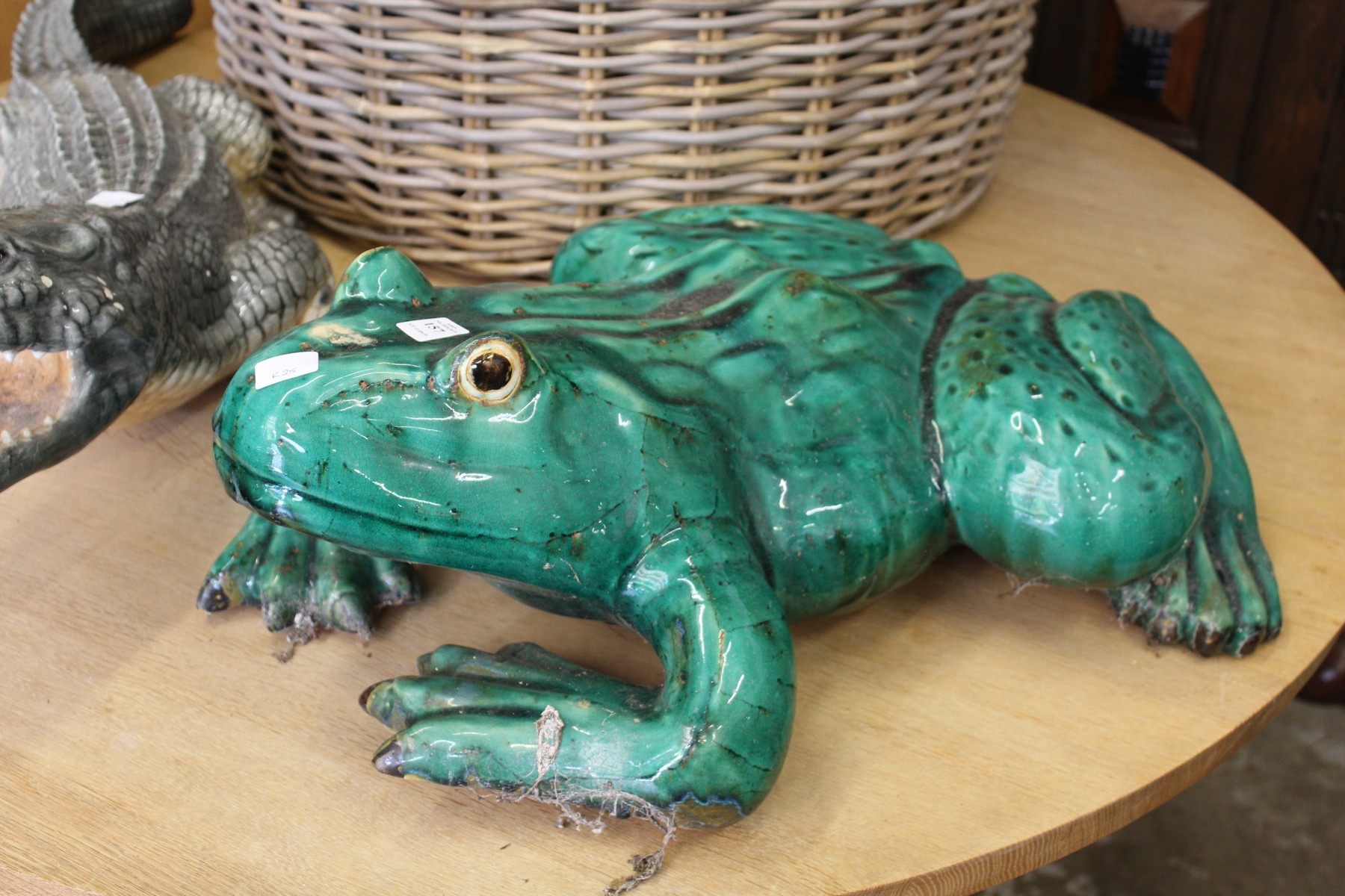 A good large painted pottery model of a frog.