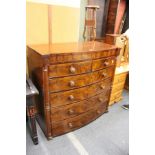 A Victorian mahogany bow front chest of drawers.