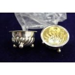 A pair of miniature silver salts.