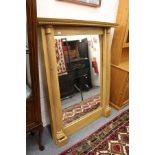 A large pine mirror.