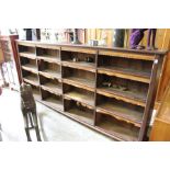 A late Victorian long oak open bookcase.