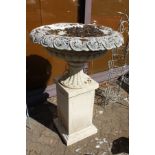 A good large classical style reconstituted stone pedestal urn on stand.