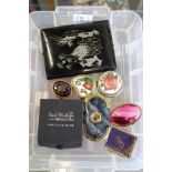 Decorative small boxes, an eastern cigarette case and collector's coins.