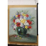 Vicente Paya, a still life of mixed flowers in a glass vase, oil on canvas, unframed.