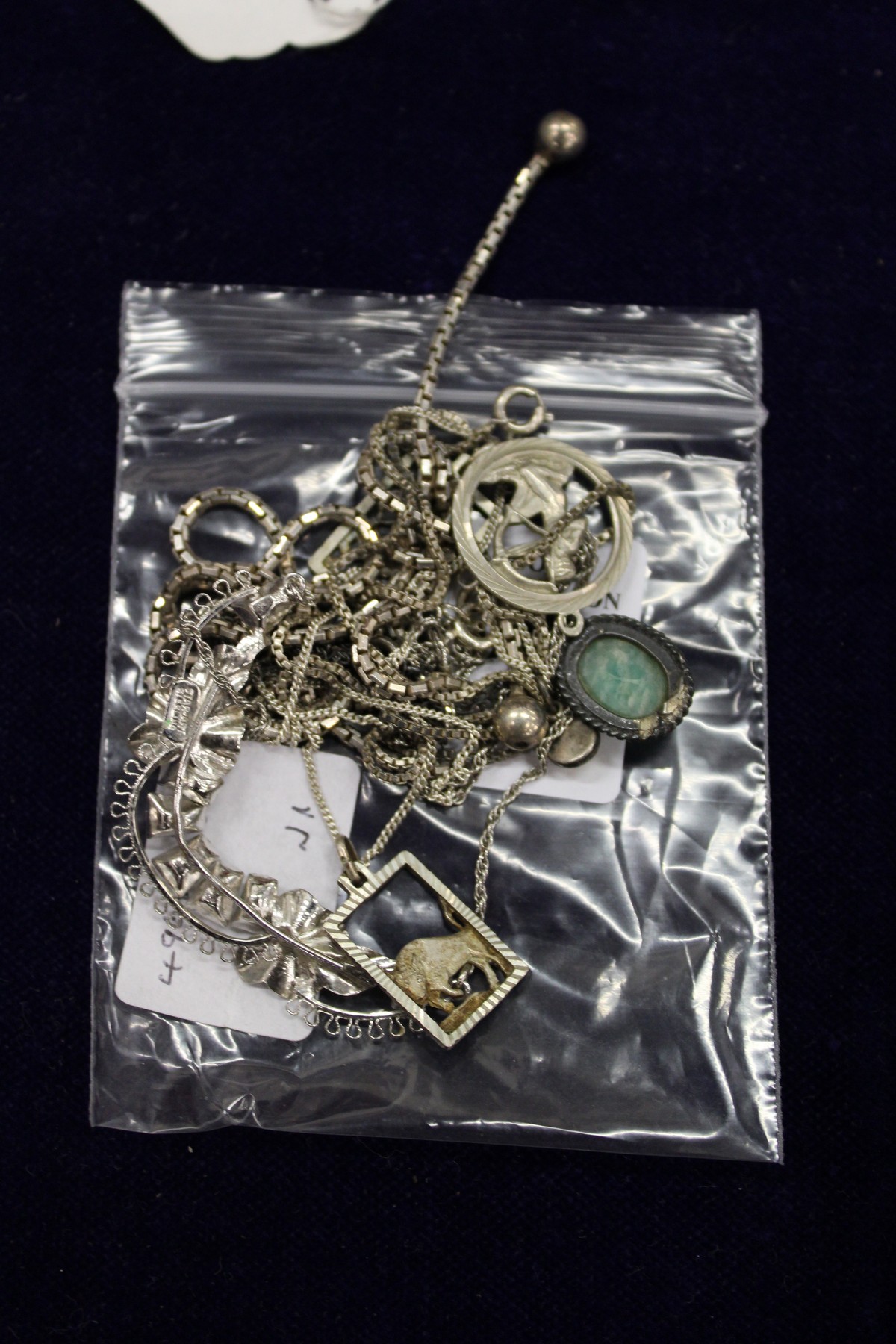 A bag of costume jewellery.