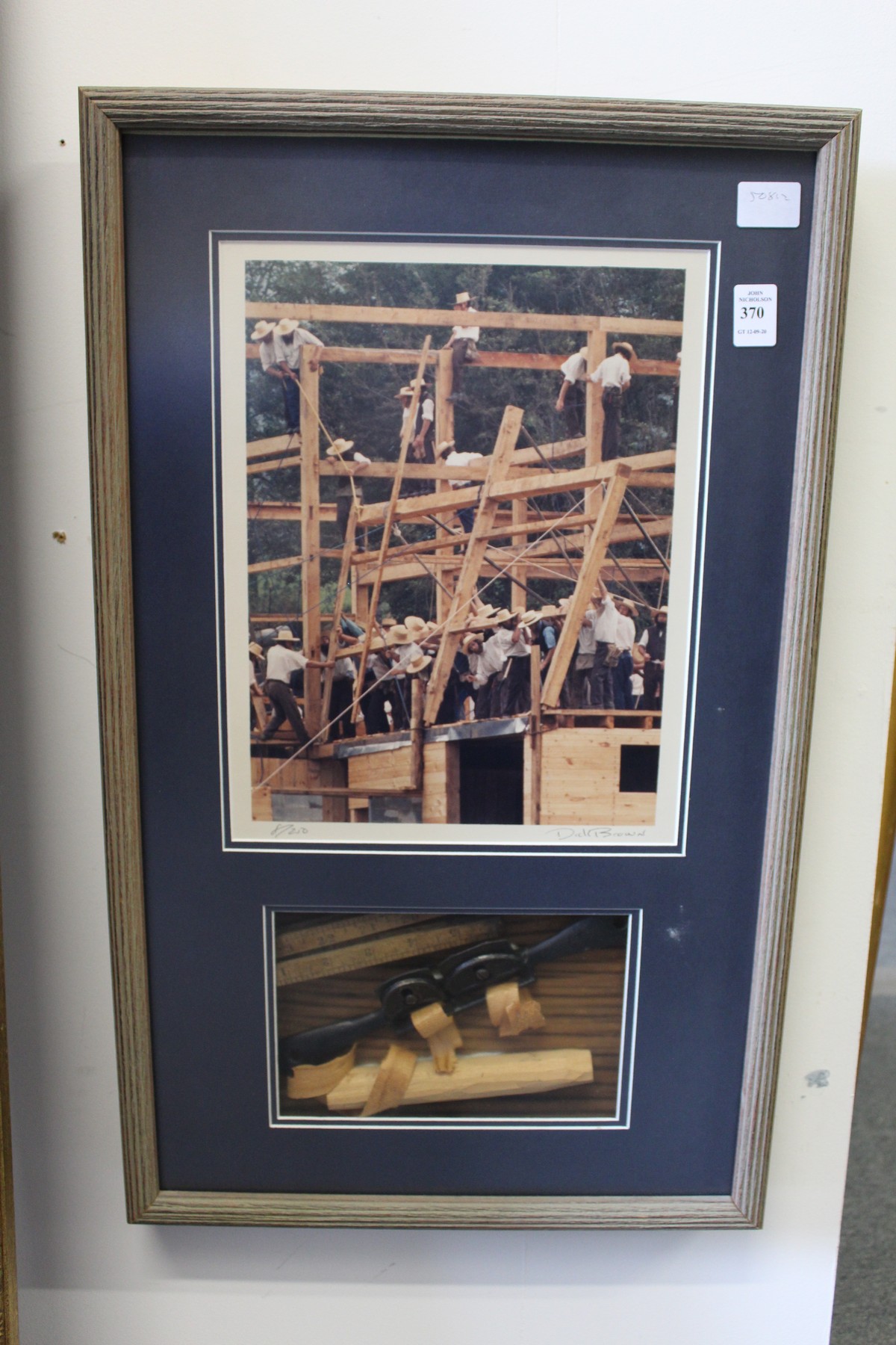 Dick Brown, a photographic print and collage, Amish People Erecting a Barn, framed and glazed.