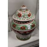 An early 20th century Chinese Ming style iron red and green ground porcelain jar and cover (rim
