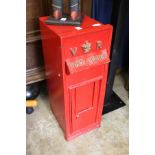 A Victorian style post box with stand.