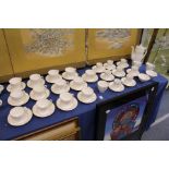 A large quantity of Spode Delphi tea cups and saucers with matching coffee cups, coffee pot, milk