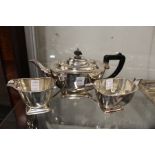 A three piece plated tea service.