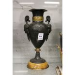 A spelter and marble classical style urn shaped vase.