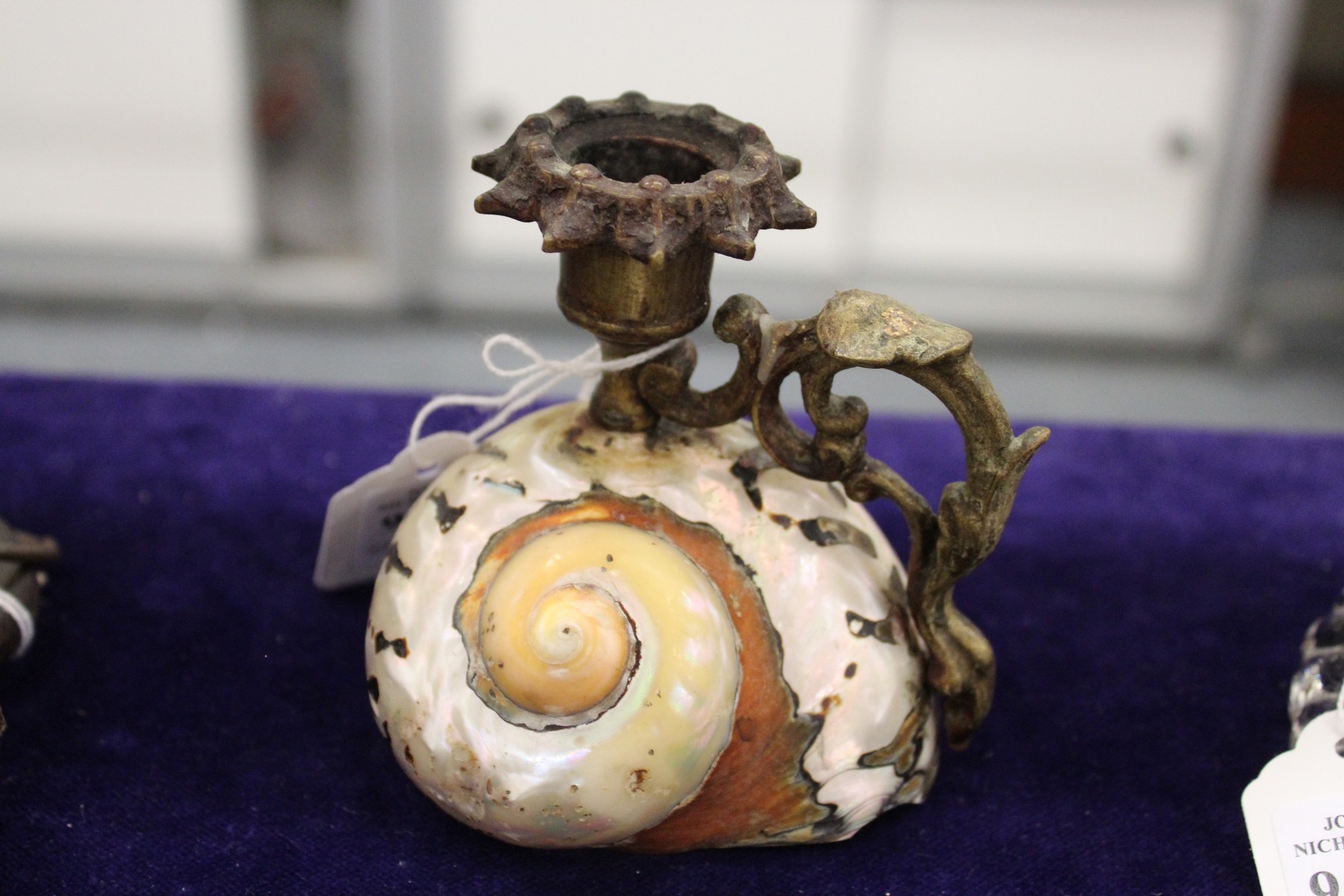 A shell candlestick.