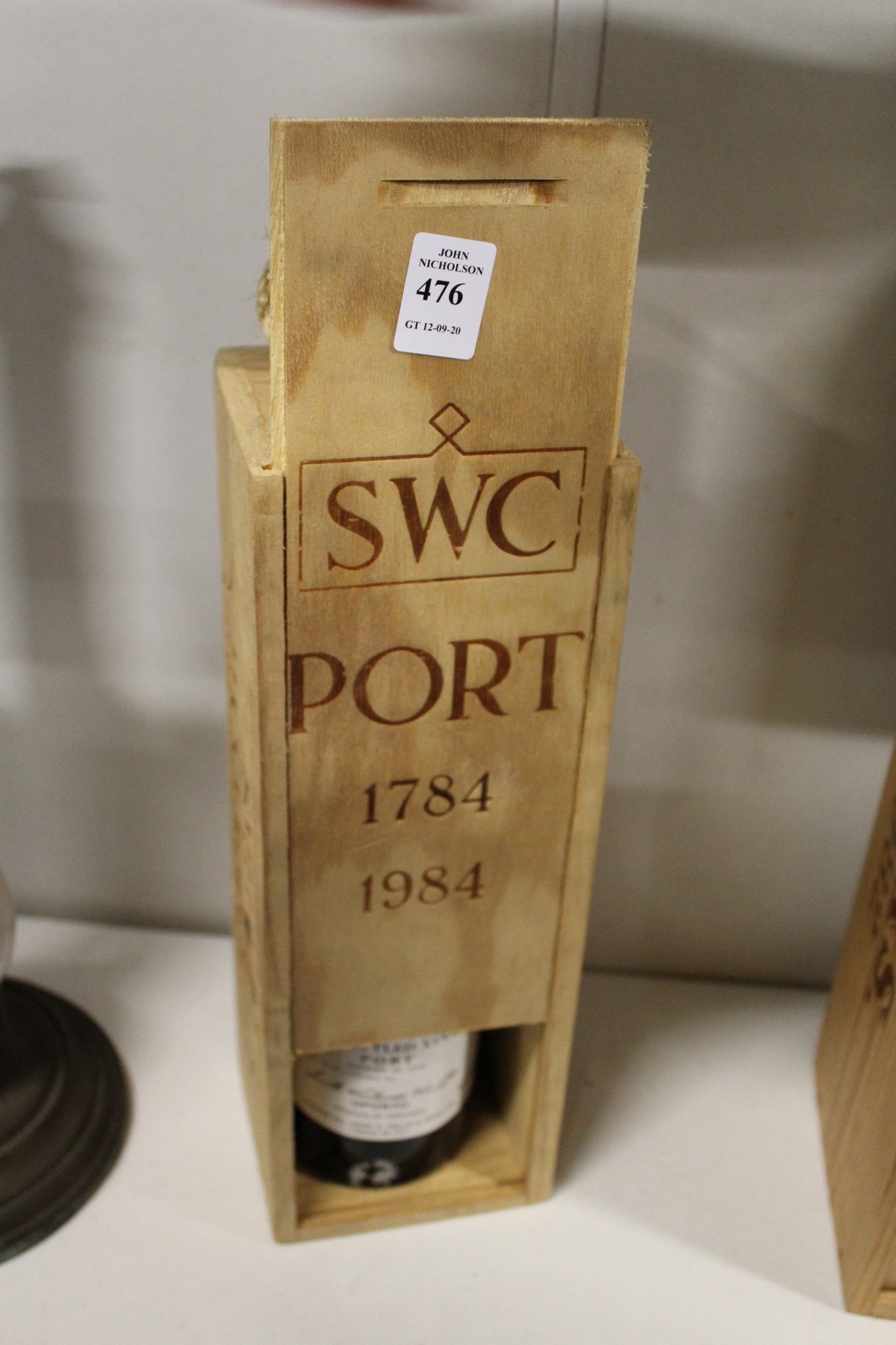 Smith Woodhouse, a bottle of late bottled vintage port 1974, in a wooden case.