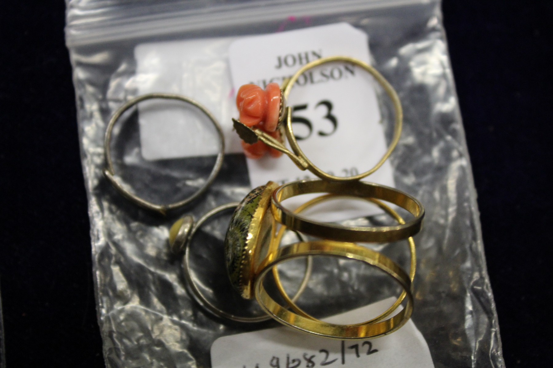 A small group of costume rings.