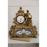 A 19th century French spelter mantle clock with Sevres style porcelain panel.