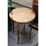 An Edwardian inlaid mahogany mahogany circular occasional table.