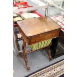 A Victorian walnut work table.