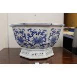 A Chinese blue and white decorated octagonal shaped jardiniere.