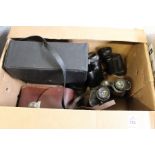 Two pairs of Carl Zeiss binoculars and a pair of modern binoculars