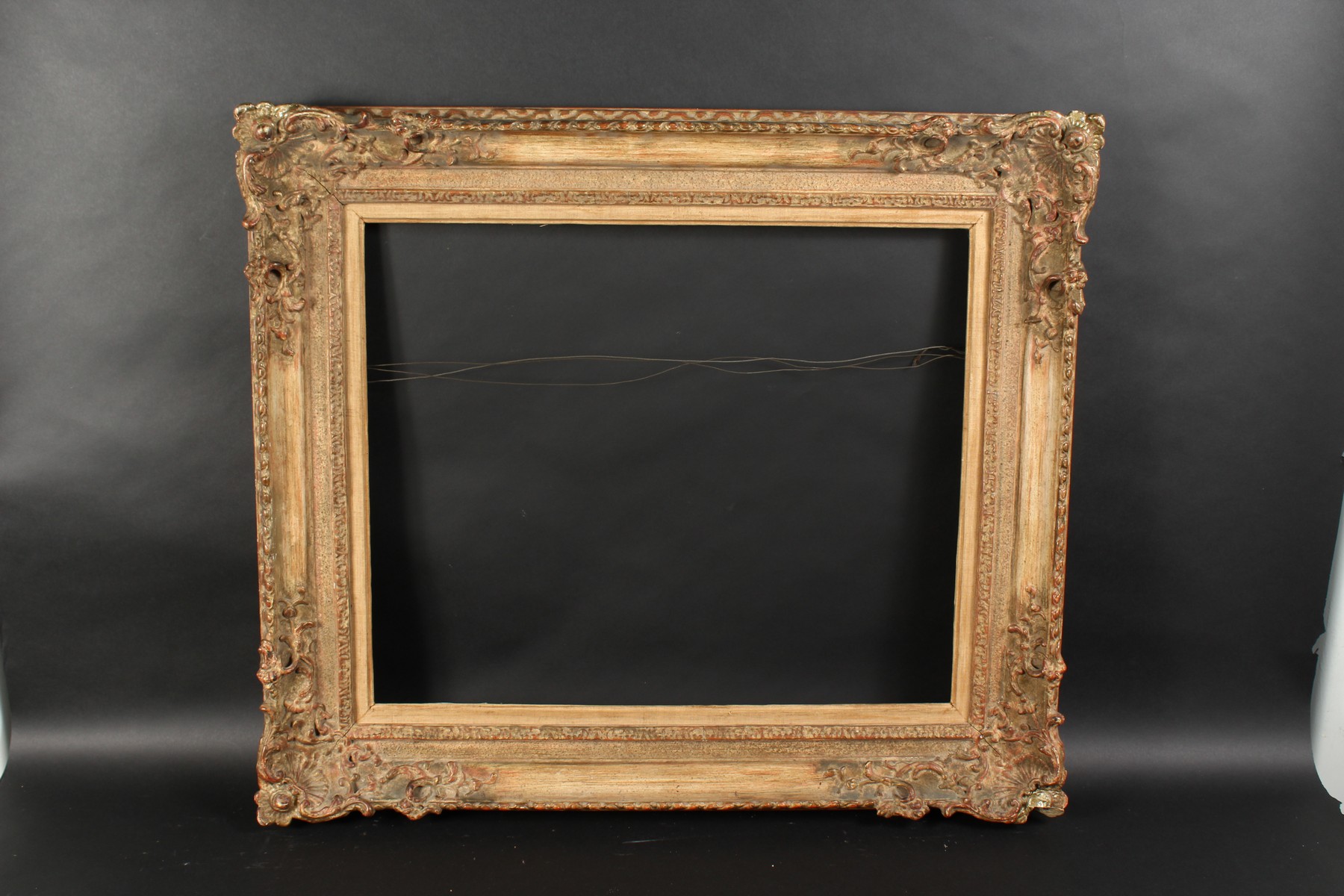 A Late 19th Century Gilt Composition Frame. 22.75" x 18.75" - 58cm x 47.5cm. 24" x 20" - 61cm x 50. - Image 2 of 3