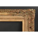 A Late 19th Century Gilt Composition Frame. 22.75" x 18.75" - 58cm x 47.5cm. 24" x 20" - 61cm x 50.