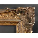 An English 18th Century Carved Frame with Pierced Corners. 28" x 40" - 71cm x 101.5cm. (Rebate