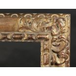 A Carved Spanish Frame, 32.5" x 46" - 82.5cm x 117cm. (Rebate Size)