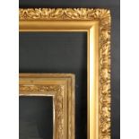 A Composite Frame with Applied Leaf Detail. 36" x 25.5" - 91.5cm x 64.75cm. And a Smaller Gilt