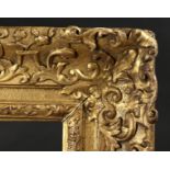 A French 18th Century Carved Frame. 38.5" x 47.25" - 97.75cm x 120cm. (Rebate Size)